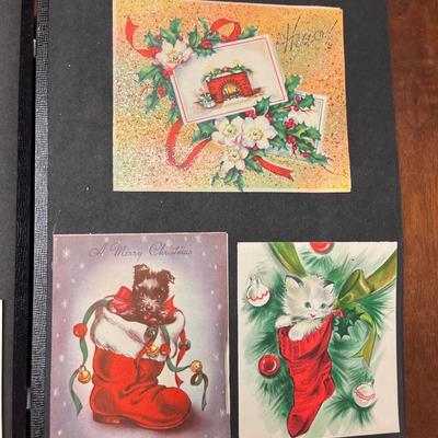3 vintage scrapbooks with various cards