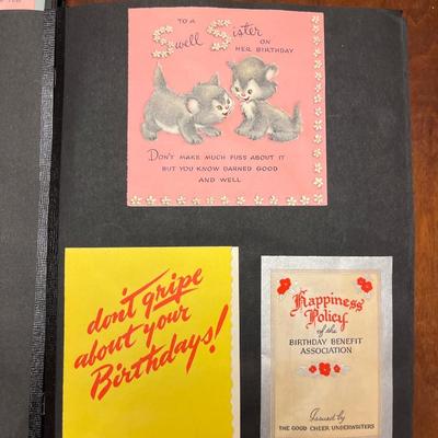 3 vintage scrapbooks with various cards