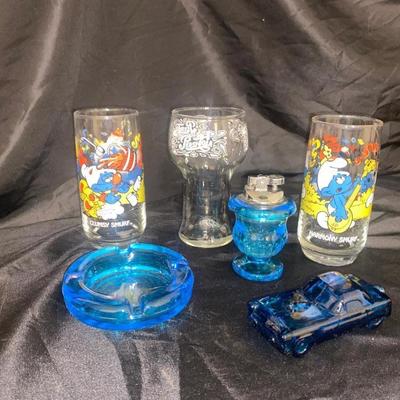 BLUE TIARA GLASS ASH TRAY AND LIGHTER, 1083 SMURFS COLLECTIBLE GLASSES, AND MORE