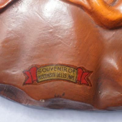 NATIVE AMERICAN WISCONSIN DELLS SOUVENIR ITEMS FROM THE 1950'S PLASTER ROUND PLAQUE AND WOOD CARVED