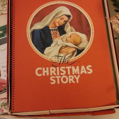 Candle, wreath, books cards