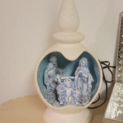 Lighted Manger scene. Metal tin