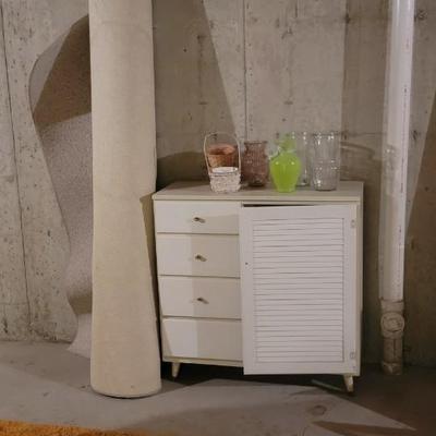 Storage chest, rug, vases
