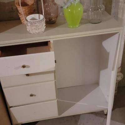 Storage chest, rug, vases