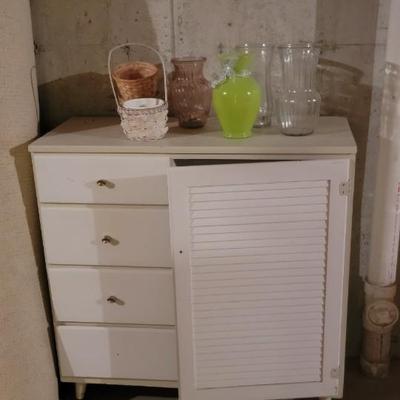 Storage chest, rug, vases
