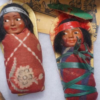 GROUPING OF FIVE SMALLER SIZE SKOOKUM DOLLS OF CHILDREN & HAND WOVEN SPLINT BASKET OF 8"