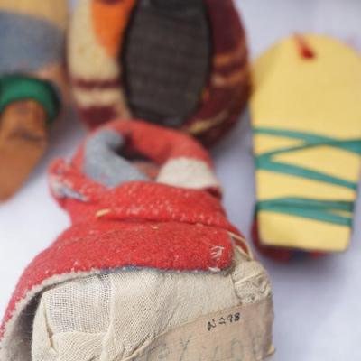 GROUPING OF FIVE SMALLER SIZE SKOOKUM DOLLS OF CHILDREN & HAND WOVEN SPLINT BASKET OF 8"