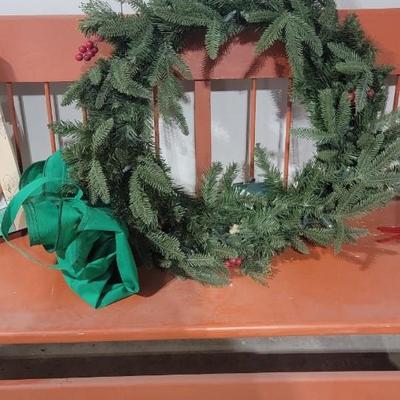 Orange wood bench, outdoor thermometer