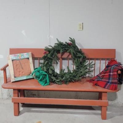 Orange wood bench, outdoor thermometer