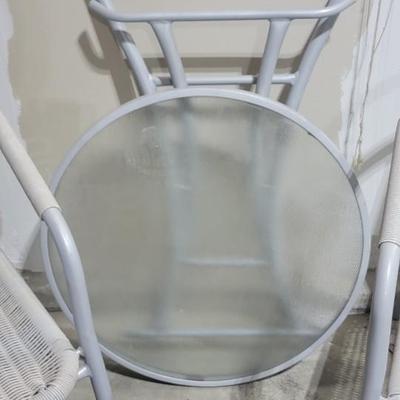 Two outdoor chairs and table