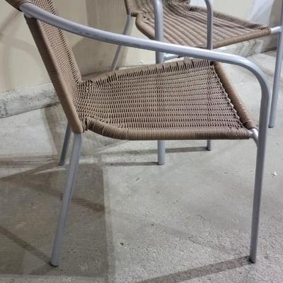 Two resin wicker patio chairs