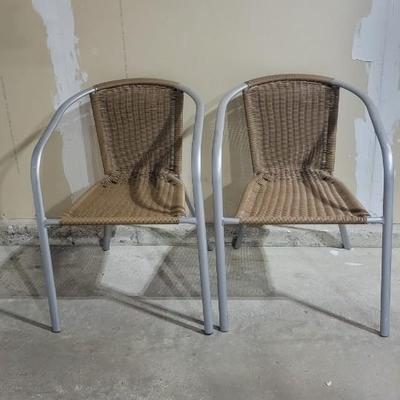 Two resin wicker patio chairs