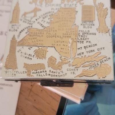 Musc postcards, buttons, NY compact