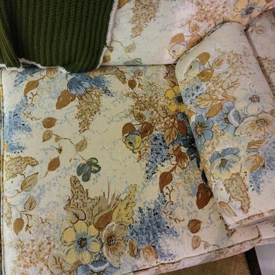 Mid century modern loveseat and your grandma's knitted throw