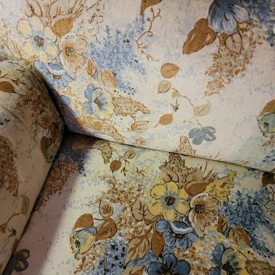 Mid century modern loveseat and your grandma's knitted throw