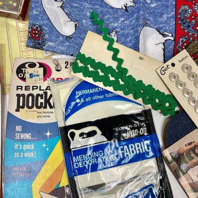 Sewing Notions Lot, vintage guides, rulers, binding, patches, buttons, etc