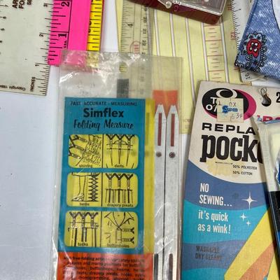 Sewing Notions Lot, vintage guides, rulers, binding, patches, buttons, etc