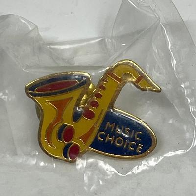 MUSIC CHOICE saxophone shaped collector’s pin