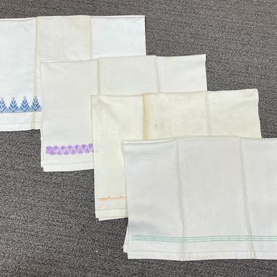 4 Vintage and embroidered Flour sack towels