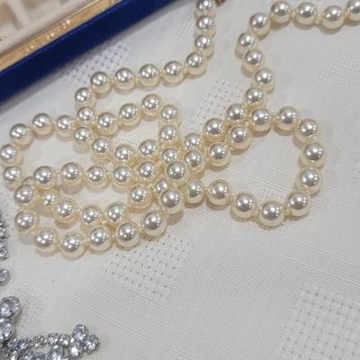 Assorted custom jewelry, blue jewelry box