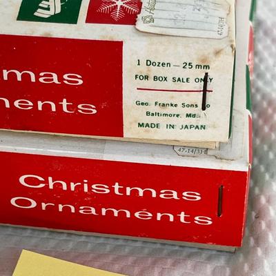 Lot 325 Boxes of mini ornaments