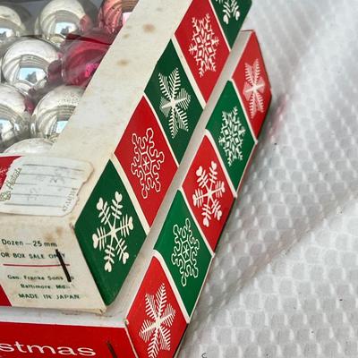 Lot 325 Boxes of mini ornaments