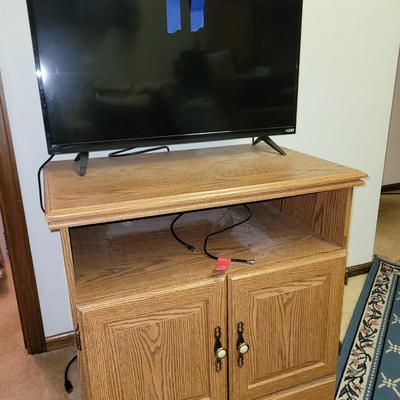 Vhs lot, tv stand and 32" tv