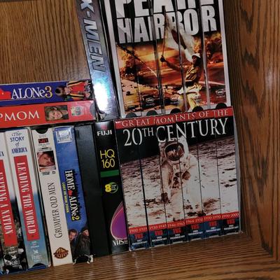 Vhs lot, tv stand and 32" tv