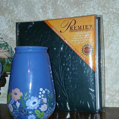 Home decor, basket of faux flowers, beautiful vase small angel and a brand-new photo album