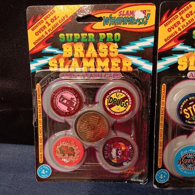 3 NEW 1994 SUPER PRO BRASS SLAMMER & 4 FLASH CAPS