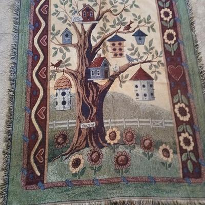 Mrs. Finch's Nest & Breakfast birdhouse with birdhouse throw blanket and wooden birdhouse basket with faux flowers