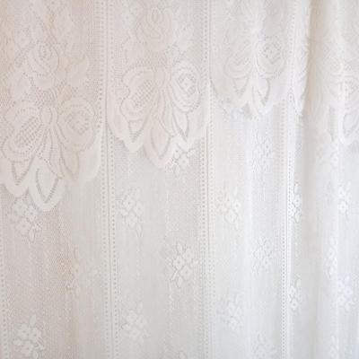 Bathroom rugs, lace shower curtain, with birdhouse hooks and a heating pad