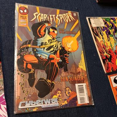 4 COMIC BOOKS (4)