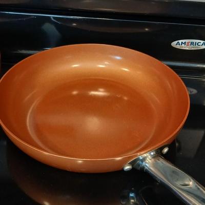 Three Copper Chef frying pans 8, 10, and 12" pans with electric burner