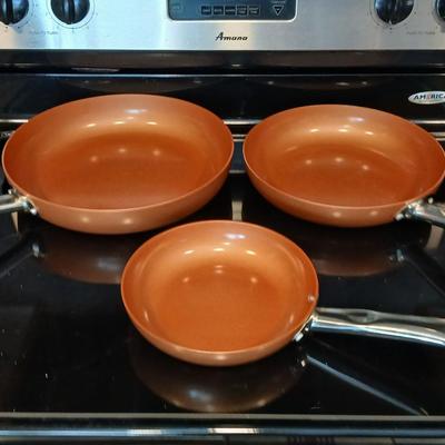 Three Copper Chef frying pans 8, 10, and 12" pans with electric burner