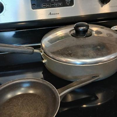 Frying pans and pots with lids