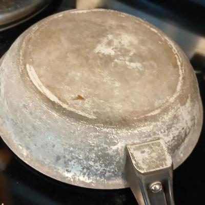 Frying pans and pots with lids