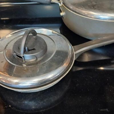 Frying pans and pots with lids