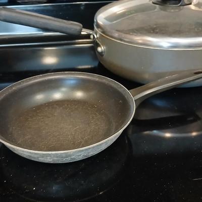 Frying pans and pots with lids