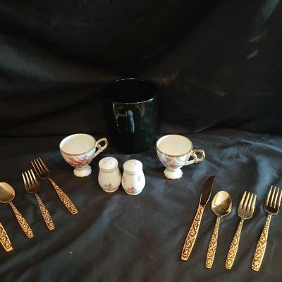 Two dainty teacups with salt & pepper and gold toned Americana Golden Heritage flatware