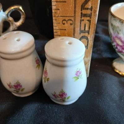 Two dainty teacups with salt & pepper and gold toned Americana Golden Heritage flatware