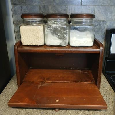 Wooden bread box with three-piece glass with wooden lid canisters and a decorative wood tray