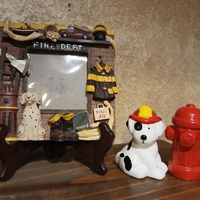 Completed Fireman puzzle with Dalmation salt & pepper shakers with a wooden shelf and picture frame
