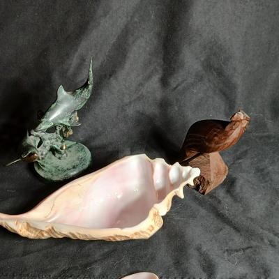 Seashell dish with spoon, dancing dolphins and a wooden Eagle