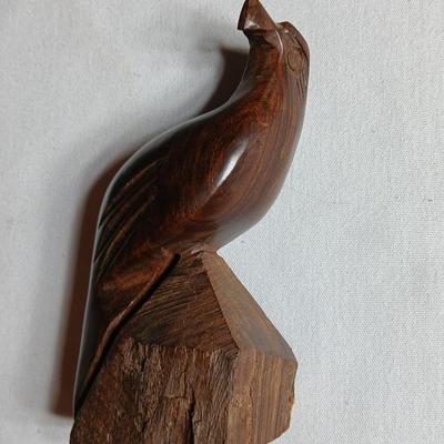 Seashell dish with spoon, dancing dolphins and a wooden Eagle