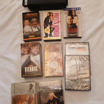 Assortment of Entertainment media, DVD's, Cd's, VHS, and cassettes