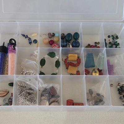 Plastic Organizer filled with Beads