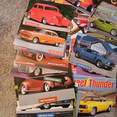 Two framed vintage car wall art one lights up! and a bunch of pictures and calendar photos of hot rods