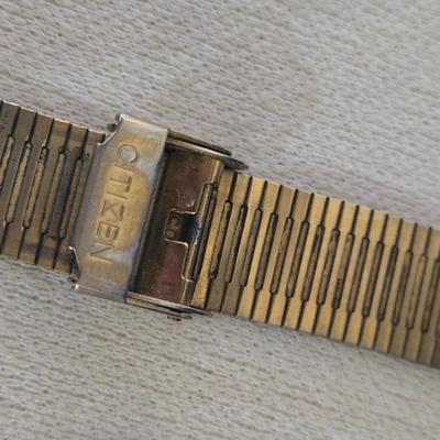 Ladies Gold Tone Seiko and Men's Gold Tone Citizen Watch