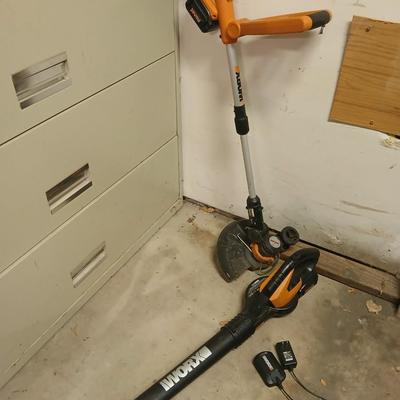 Worx 20-volt battery operated weed eater and leaf blower with 4 batteries and 1 charger